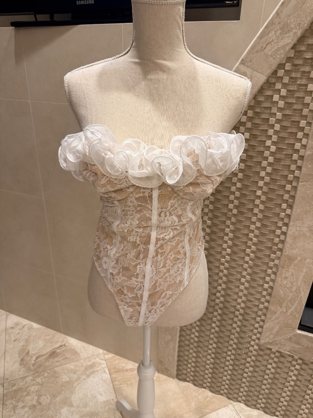Ivory colored bodysuit